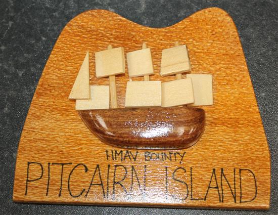 A collection of twenty one Pitcairn Islands souvenir carved hardwood models, diorama 15in.